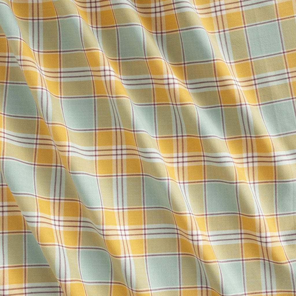 a close up of a yellow and blue plaid fabric