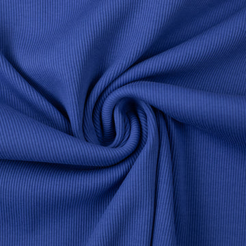 Cobalt blue rib knit fabric gathered into a swirl.