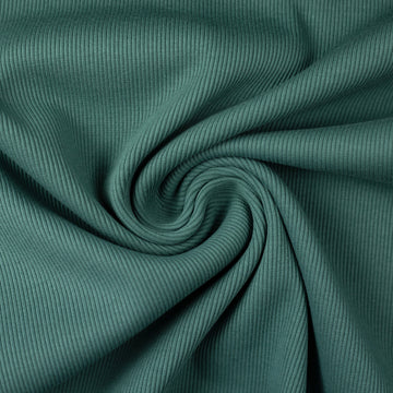 Green rib knit fabric gathered into a swirl.