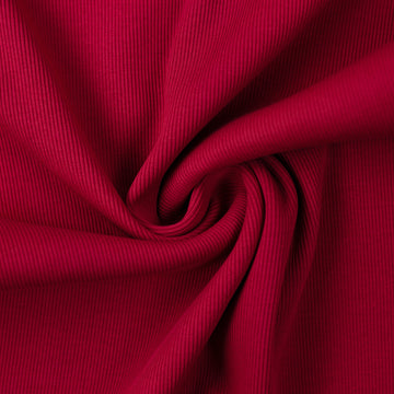 Cherry red rib knit fabric gathered into a swirl.