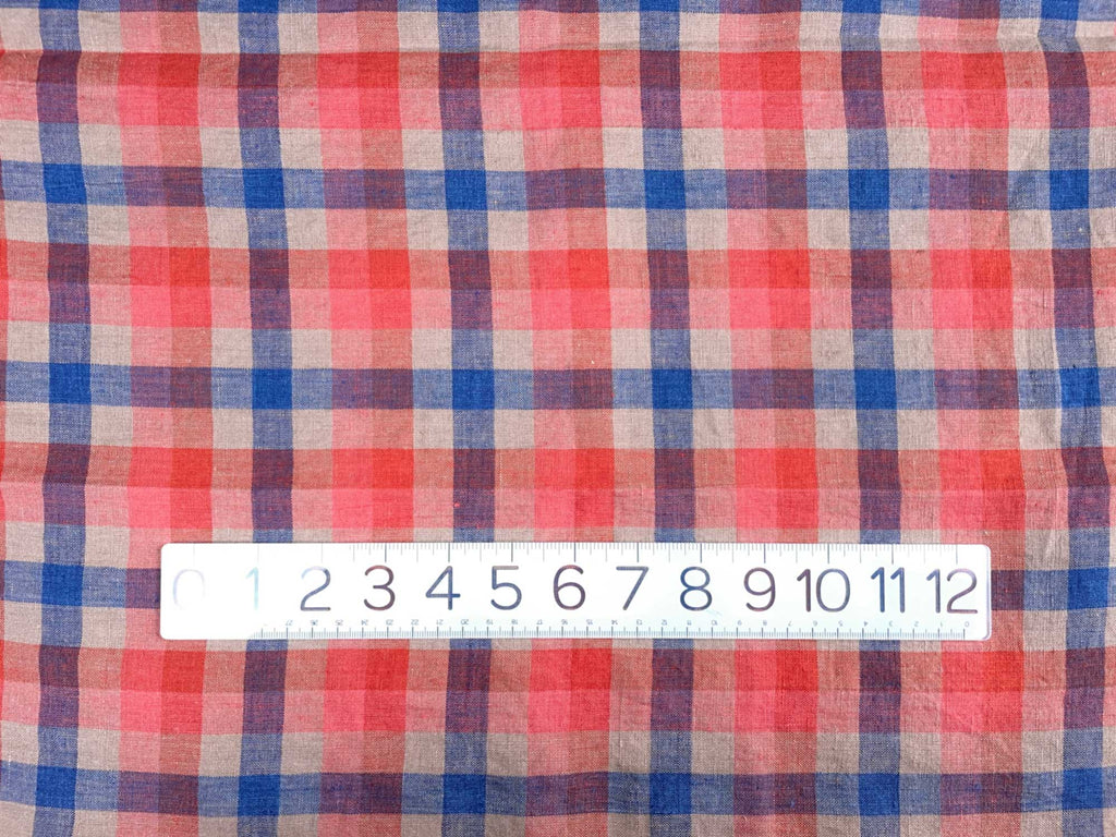 a close up of a red and blue checkered shirt