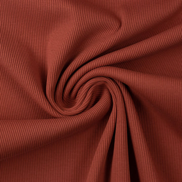 Teak colored rib knit fabric gathered into a swirl.